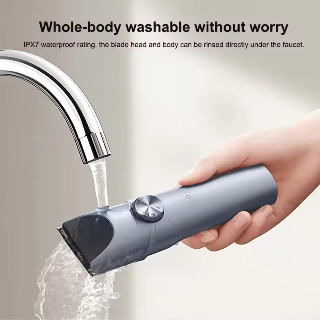 IPX7 waterproof hair clipper being washed under water tap
