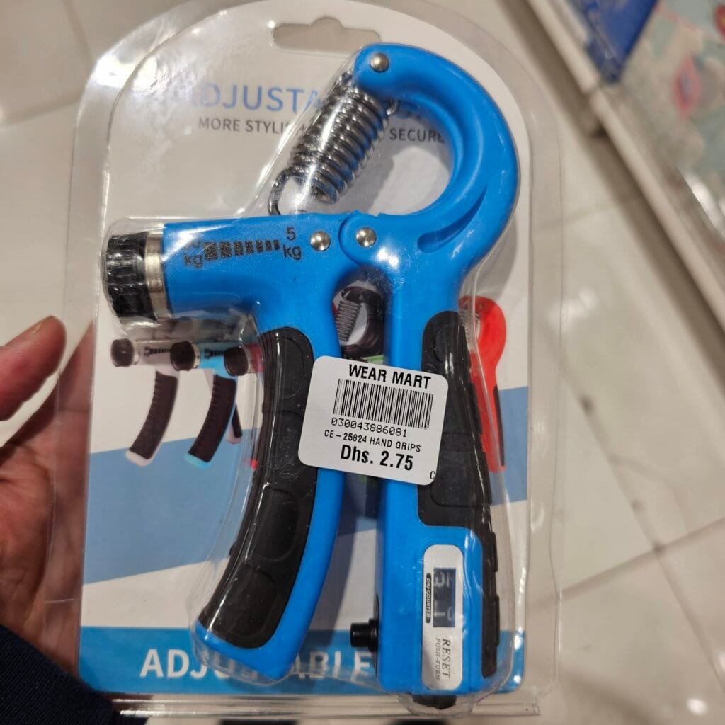 My personal photo of the cheap hand gripper, showing the blue version.
