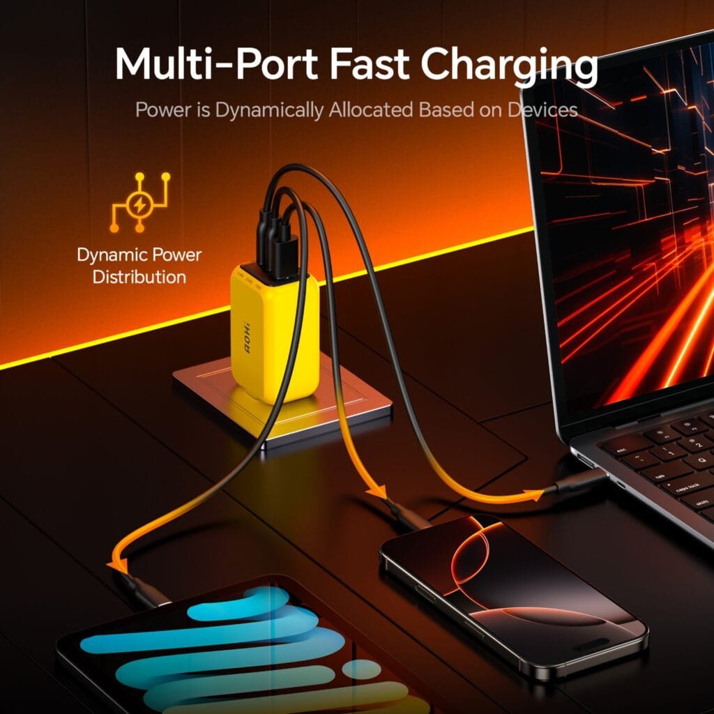 AOHI 65W GaN Charger Review: Multi-port fast charging setup on a desk with laptop and smartphone