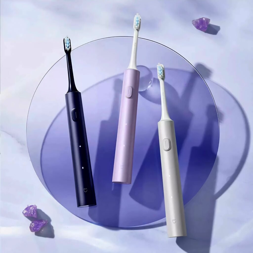 Mijia Sonic Electric Toothbrush T302 displayed in three color options: black, lavender, and white.