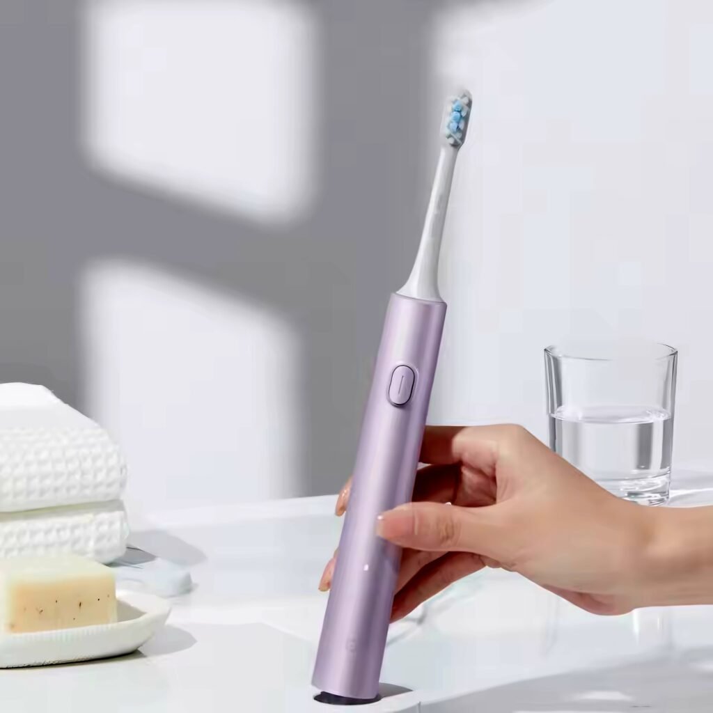 Mijia Sonic Electric Toothbrush T302 placed on a table, showing its sleek and ergonomic design for daily use.