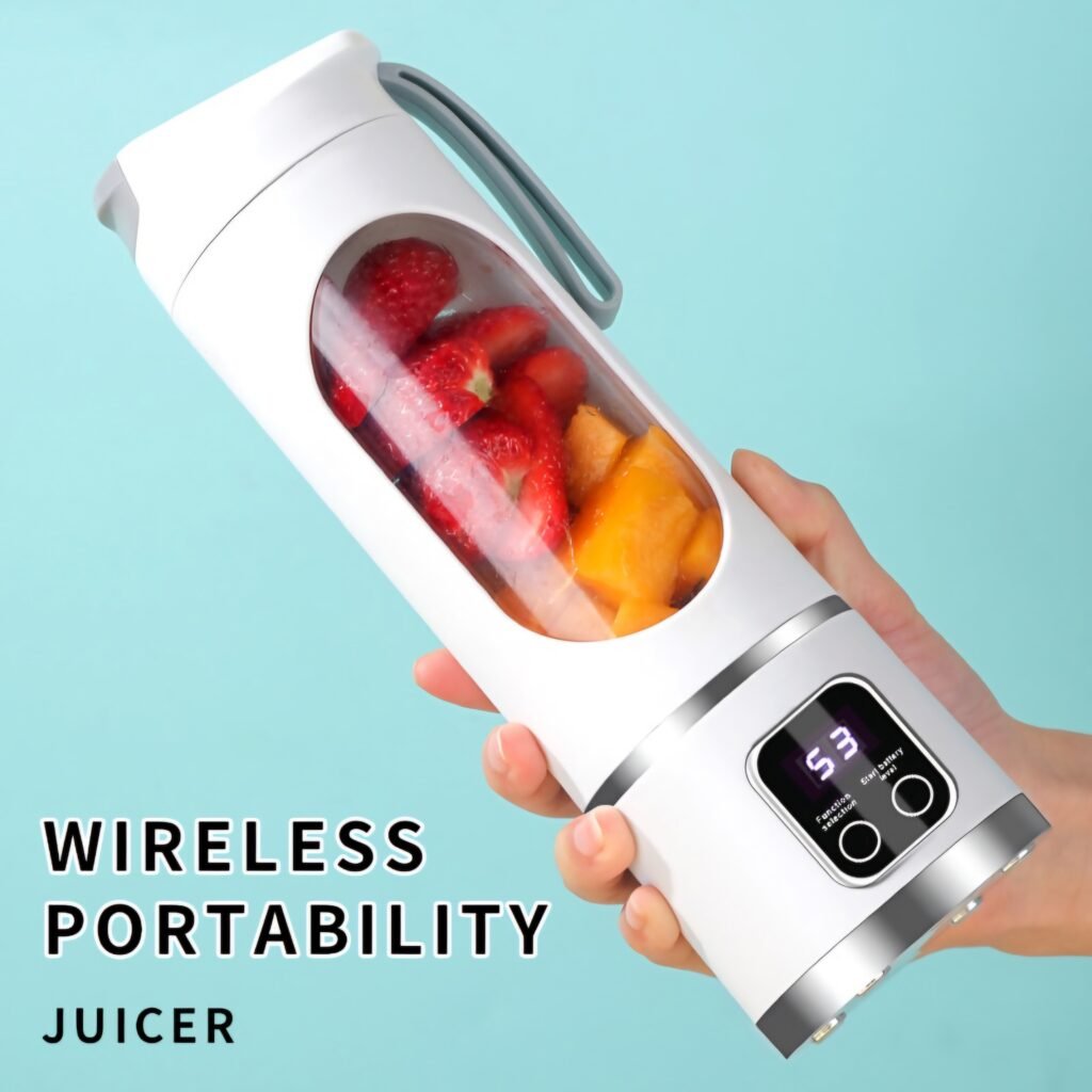 Hand holding white HS-860 wireless portable juicer filled with fresh fruit chunks