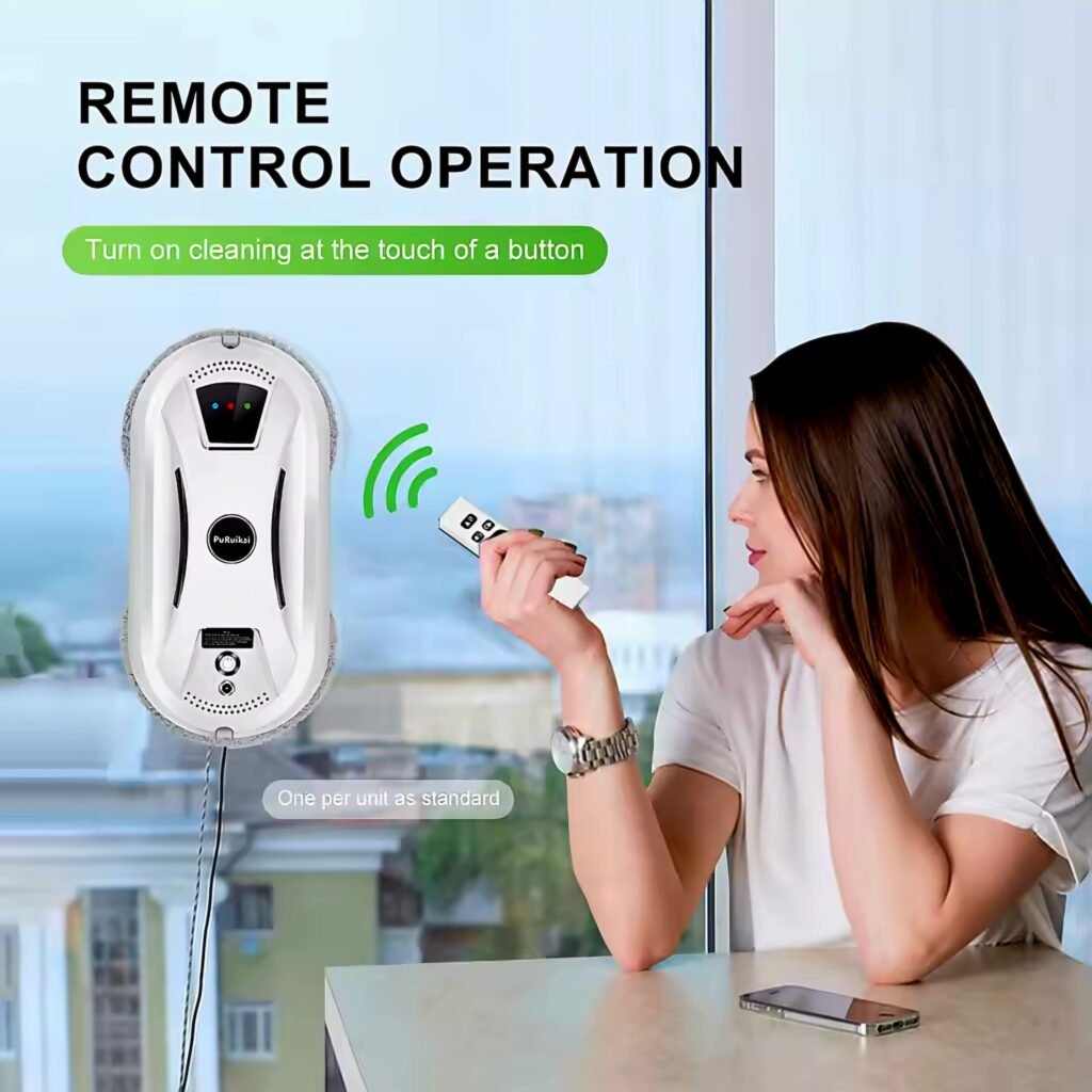 Woman using remote control to operate a smart robotic window cleaner indoors