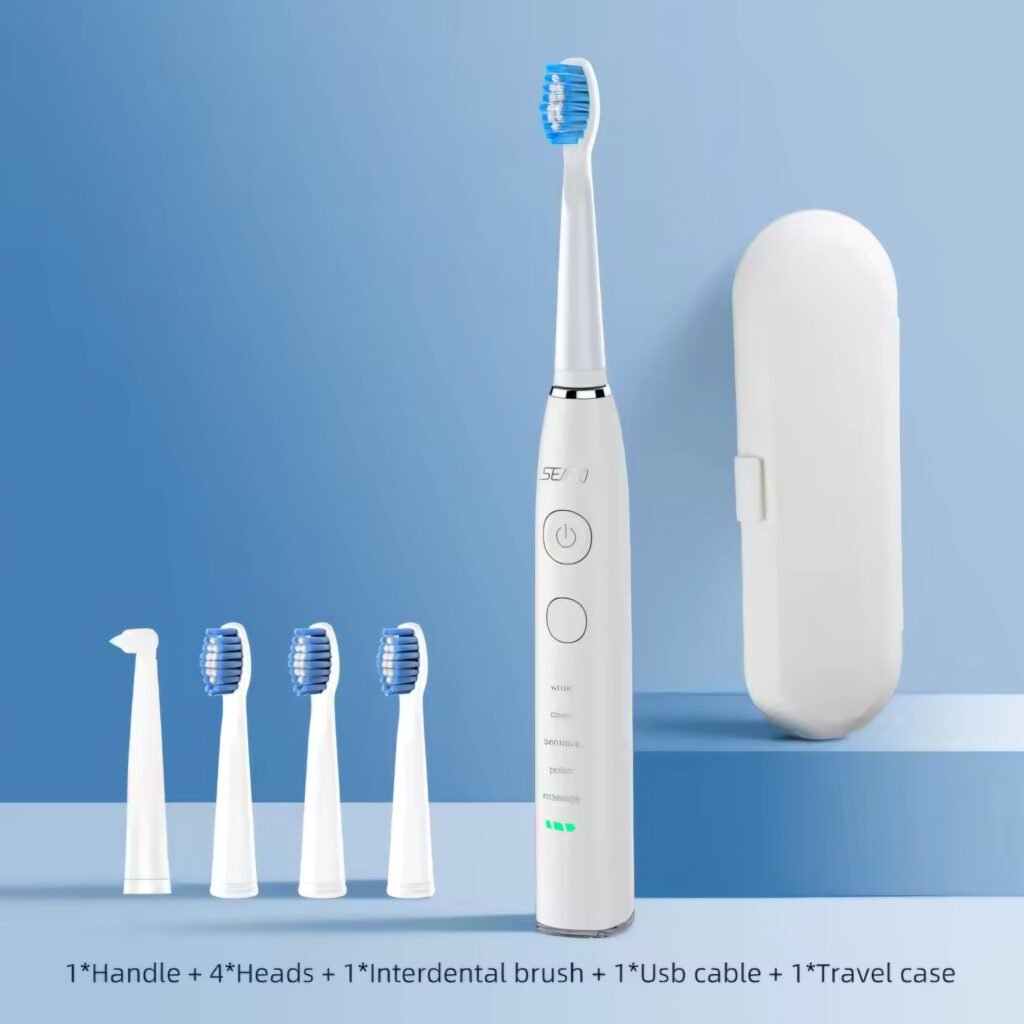 Seago SG-575 white sonic toothbrush set with travel case and replacement heads.