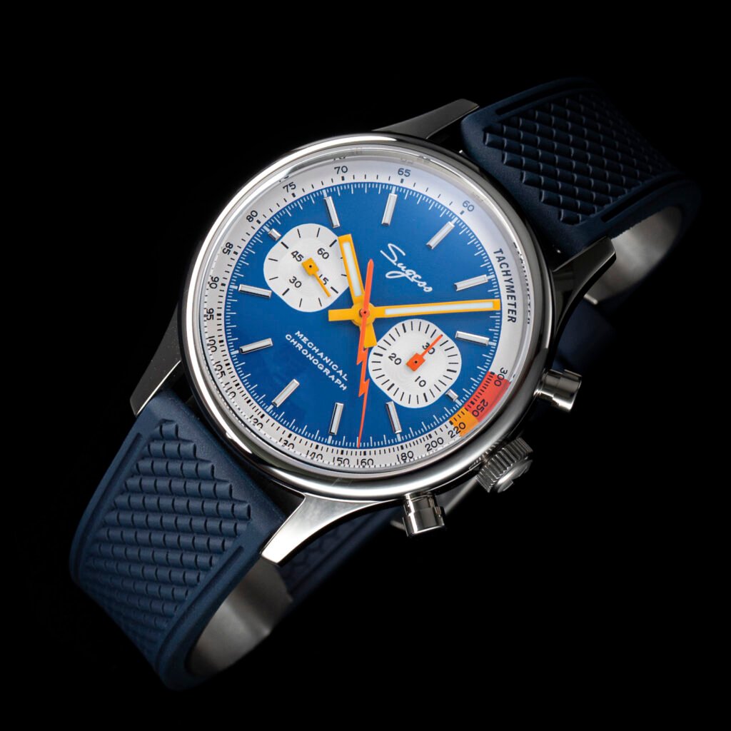 Sugess mechanical watch with a light blue dial and brown leather rally strap including an inset of the swanneck version movement.