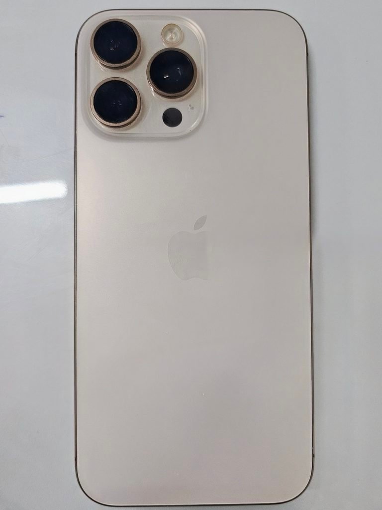 iPhone 16 Pro Max in rose gold color showing triple camera setup and Apple logo on back panel