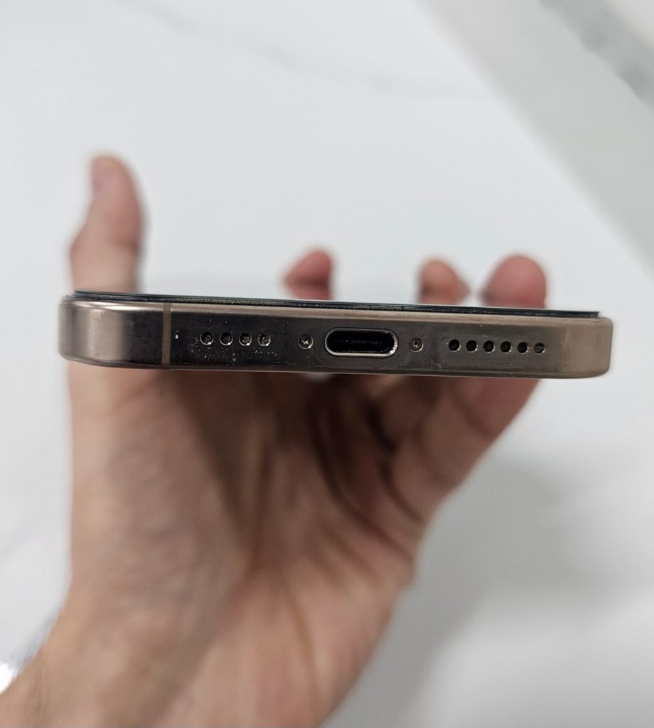 iPhone 16 Pro Max bottom edge with USB-C port and speaker grille
