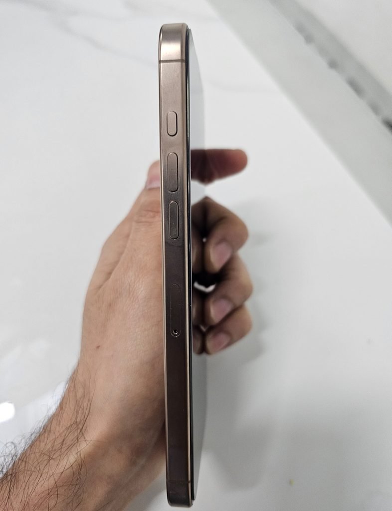 iPhone 16 Pro Max side profile showing titanium frame and side buttons