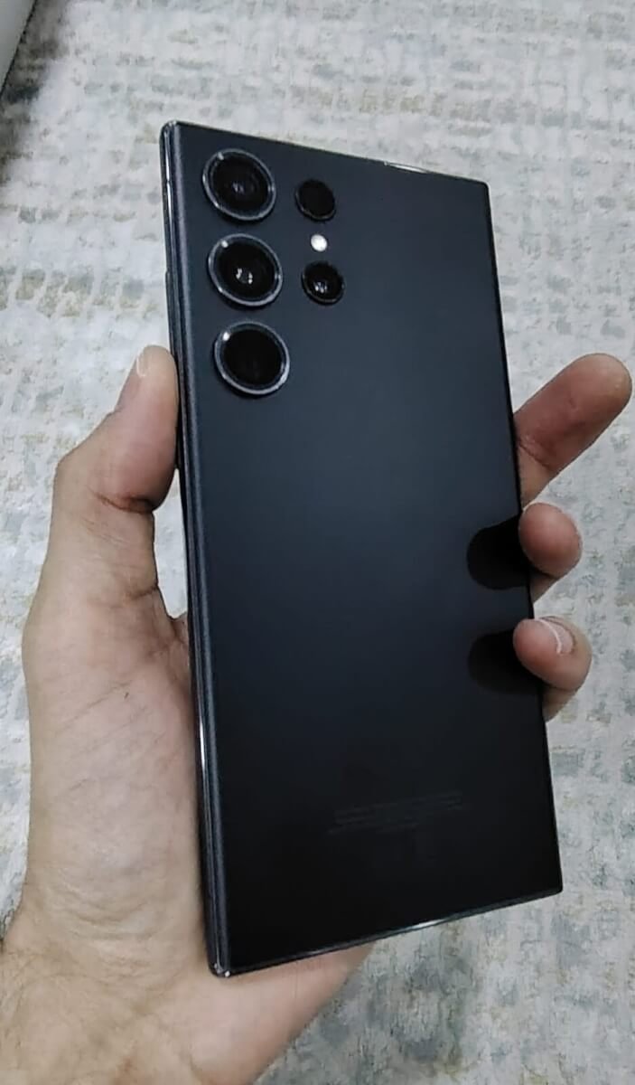 Galaxy S23 Ultra side angle showing 200MP quad camera setup and matte black finish